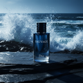 Dior Sauvage on dark slate rocks with ocean waves