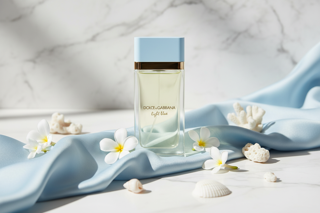 Dolce & Gabbana Light Blue for Women on marble with blue silk and seashells