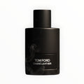 Tom Ford Ombré Leather Eau de Parfum in a matte black bottle with a black cap. Smoky accents.